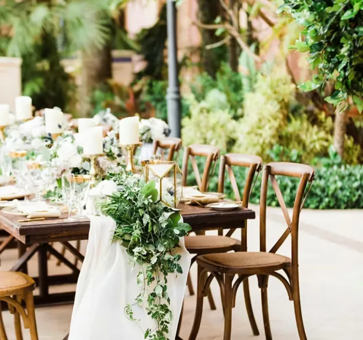 Interior view of Coral Gables Country Club with a bar, a dance floor, and a stage