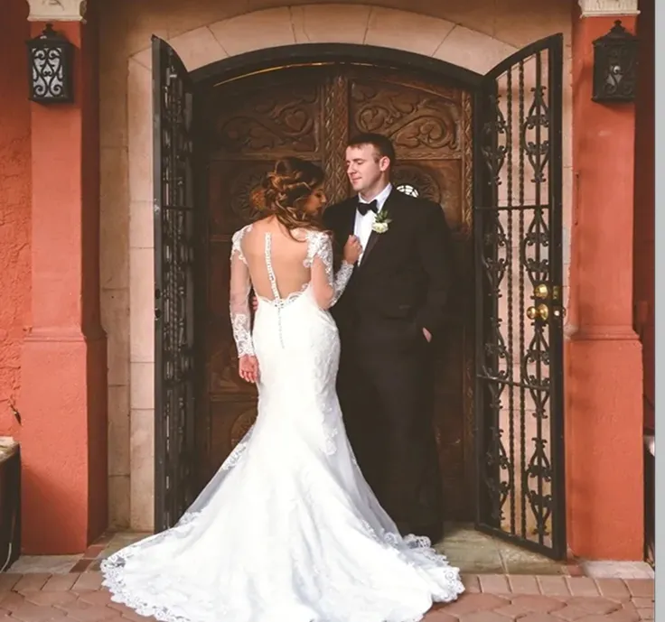 Interior view of Thalatta Estate with a bar, a dance floor, and a stage