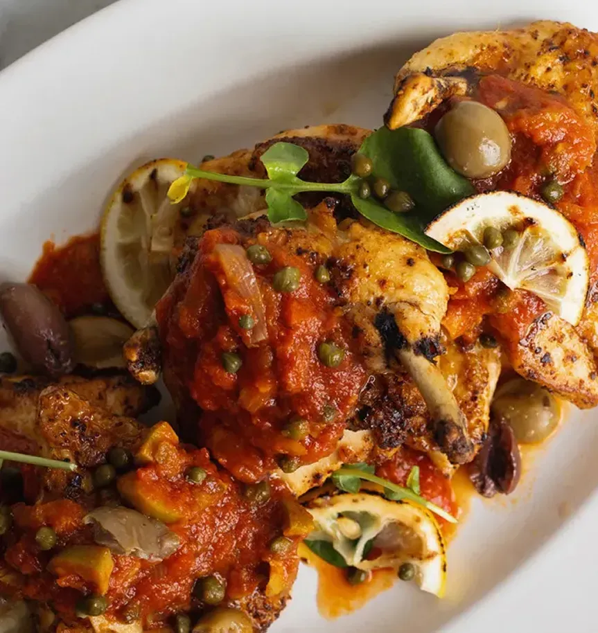 Elegant catering table with assorted appetizers and finger foods arranged for a wedding reception