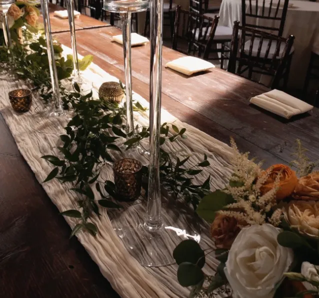 Outdoor ceremony setup at Tringali Barn with natural lakeside backdrop and rustic charm